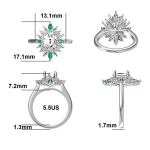 May include: A silver ring with a central clear stone, surrounded by smaller clear and green stones in a starburst design. The ring's dimensions are shown, including a 13.1mm width and a 17.1mm length. The ring size is 5.5 US.