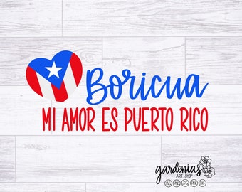 May include: A red heart with the Puerto Rican flag inside, the text "Borícua" in blue cursive, and the text "Mi Amor Es Puerto Rico" in red cursive.