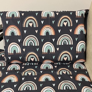 May include: A black and white bedding set with a rainbow and heart pattern. The bedding set features a pillowcase and a duvet cover.
