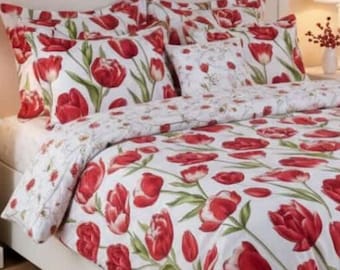 Big red tulips pillowcases bed linen on white background