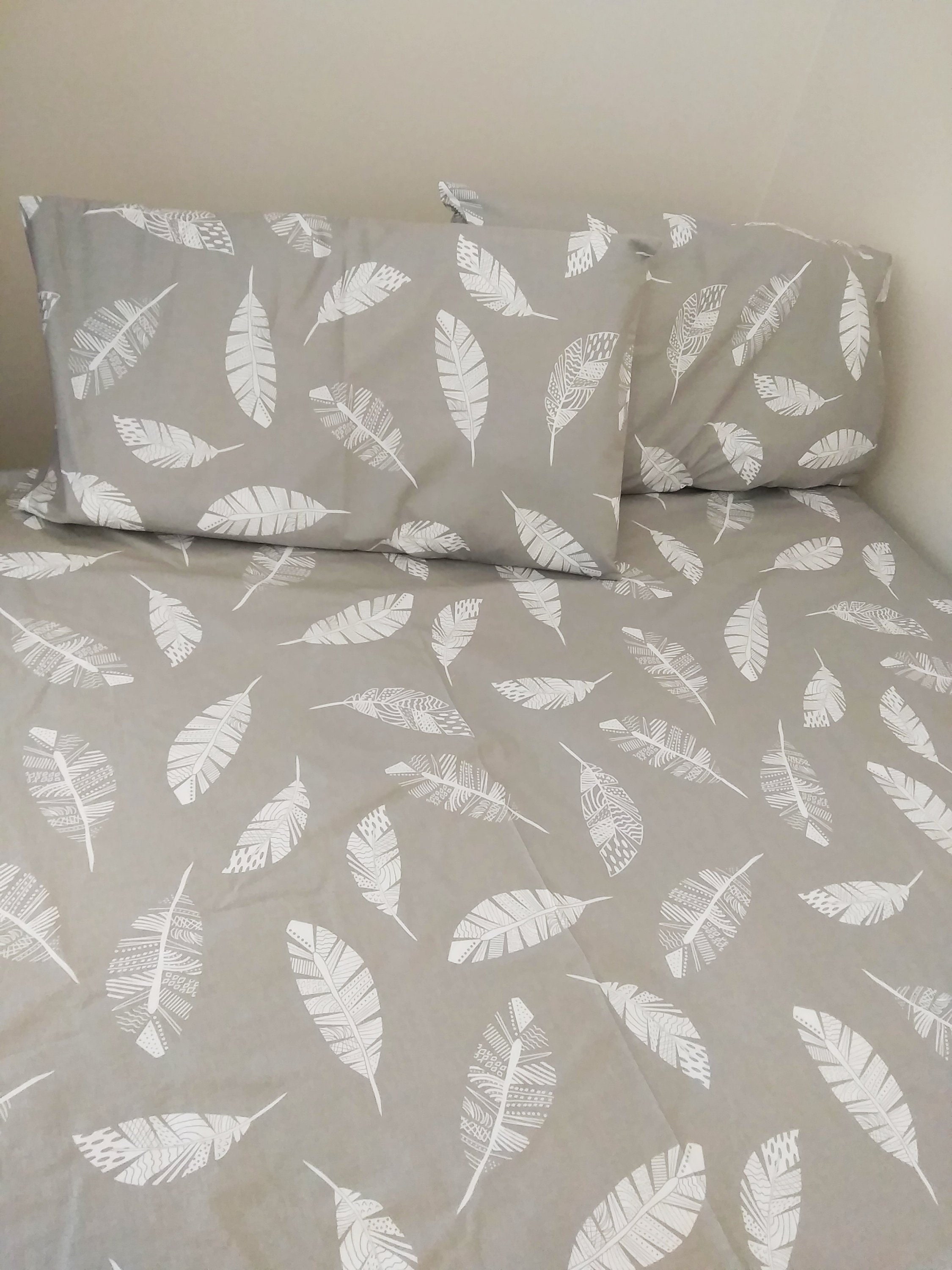 White bedding with grey pillows shop