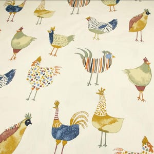 May include: Cream-coloured fabric with a repeating pattern of stylised chickens and roosters. The birds are in various colours, including blue, yellow, orange, and green, with decorative details like crowns and polka dots. The design has a playful, illustrative style.