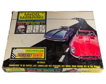 Set de coches de slot Aurora Model Motoring Stirling Moss Thunderjet 500 de 1963 con 4 coches.