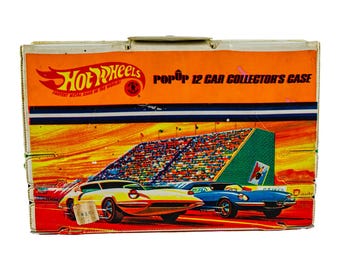 Set da collezione vintage Hot Wheels Mattel del 1967 con 12 macchinine a scomparsa e libretto di istruzioni (solo la custodia).