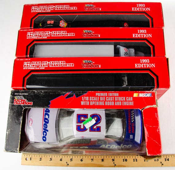 Assorted Racing Champions NASCAR Transporter Diecast Trucks