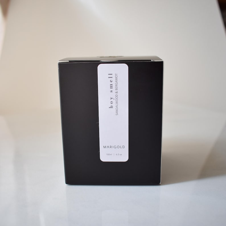 sandalwood and bergamot candle in amber jar box