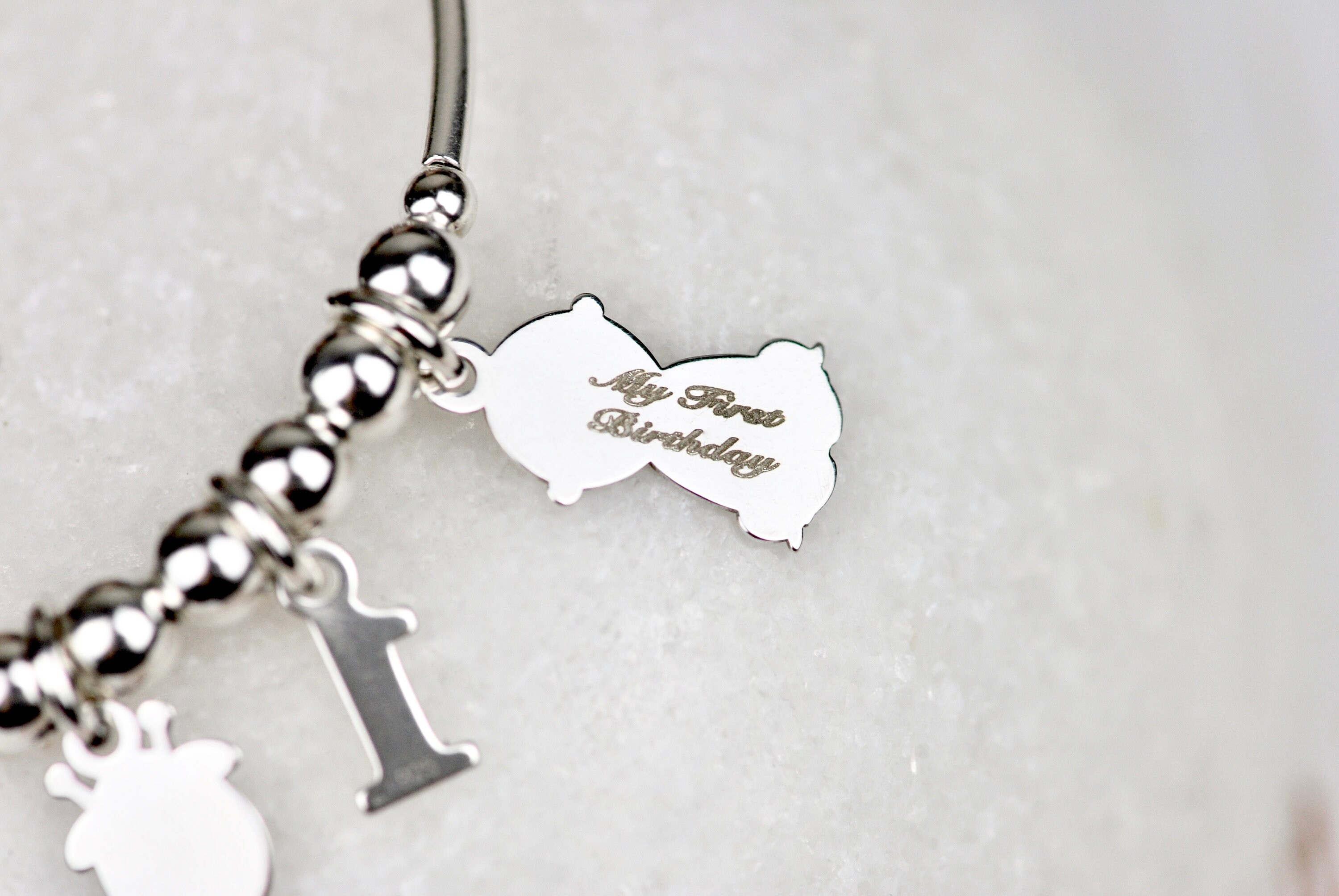 First birthday best sale charm