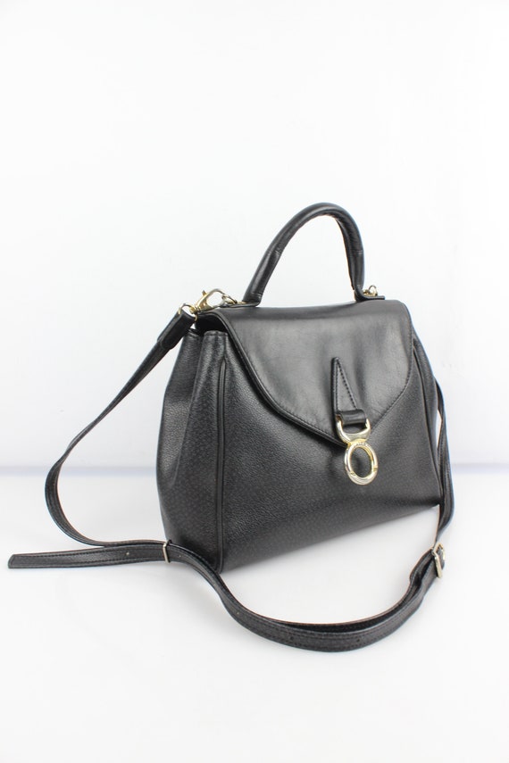 Vintage black leather and synthetic leather should