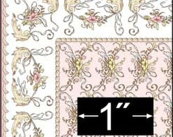 May include: A square fabric with a repeating floral and scroll design in pink, cream, and gold. The border is pink with a scalloped edge. The image shows a 1-inch measurement.