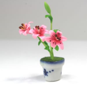 Dollhouse Miniature Pink Asiatic Lily in a Blue and White Pot by Miniatures World