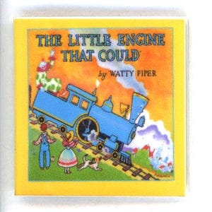May include: A children's book cover with a blue train on tracks, the title "THE LITTLE ENGINE THAT COULD" and the author "by WATTY PIPER" on a yellow background. The illustration includes figures and a dog.