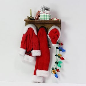 Artisan Christmas Santa Coat with Pants Decorated Wall Rack by Shadow Box