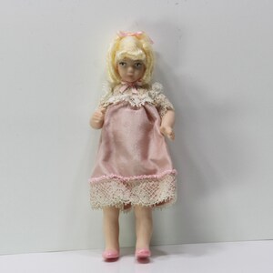 Dollhouse Miniature Blonde Haired Porcelain Girl Doll by doll Artisan Patsy Thomas