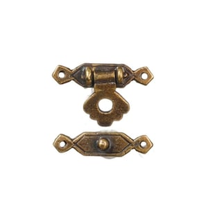 May include: Antique brass-toned cabinet latch set. The set includes a decorative latch with a floral-inspired design and a matching strike plate. The hardware features a vintage aesthetic, perfect for adding a touch of classic charm to furniture or boxes.