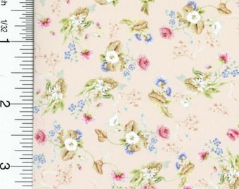 May include: A floral pattern fabric featuring a repeating design of pink, white, and blue flowers with green leaves on a light peach background. The fabric is measured in inches, with a scale visible along the left edge.