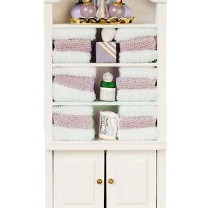 Dollhouse Miniature Bathroom Shelves Filled with Pink Towels and Accessories