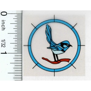 May include: A sticker featuring a stylized blue bird with a long tail, perched on a red branch within a light blue circle. The design includes black accents and is set against a white background. The sticker is approximately 1 inch in size.