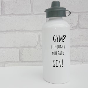 May include: White water bottle with a black lid and a black inscription that reads "GYM? I THOUGHT YOU SAID GIN!"