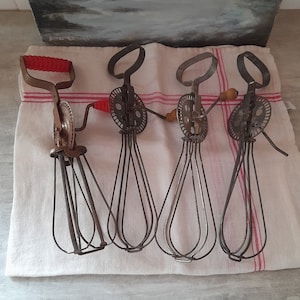 Four vintage hand whisks - vintage metal kitchen utensils, baking, patisserie decor kitchen café, distressed, rusty, one missing knob