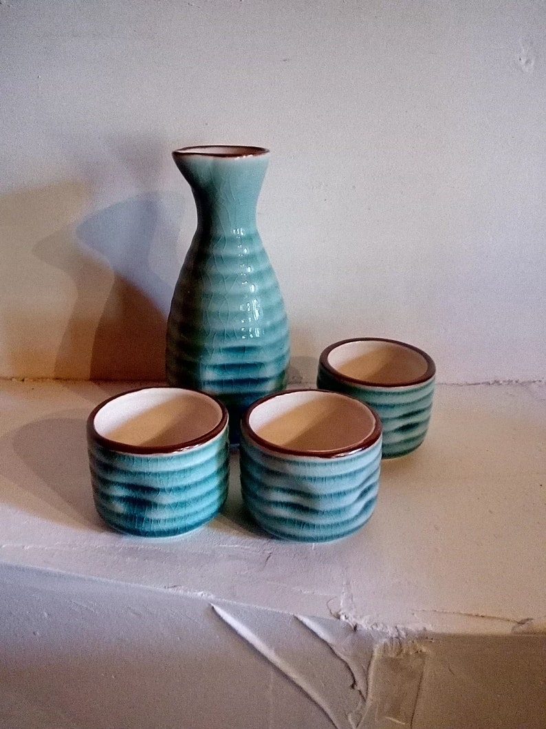 greeny blue liqueur set pretty crackle- glazed small ceramic pourer and three cups Sak\u00e9 set