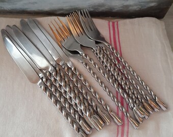 Pretty cutlery, seven knives and seven forks - French cutlery - metal, stainless steel - pretty twisted handle design, weightly