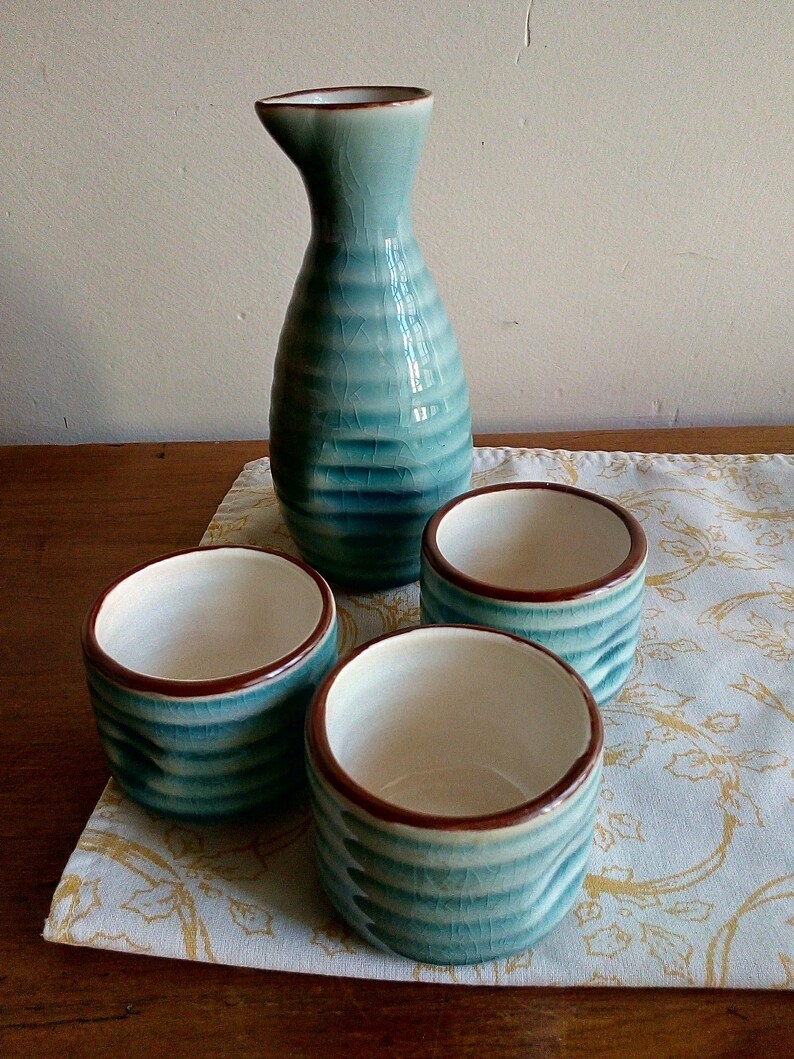 greeny blue liqueur set pretty crackle- glazed small ceramic pourer and three cups Sak\u00e9 set