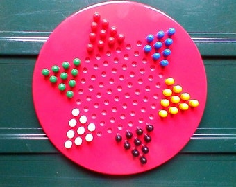 Vintage red lacquered Chinese Checkers board and pegs (2 missing) - unboxed