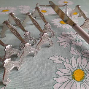 Eight knife rests, five Gallia and three Alfénide - French vintage silver plated, stamped, Christofle.