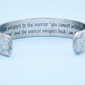 Inspirational Bracelet - Fate whispers to the warrior "you cannot withstand  the storm" and the warrior whispers back I am the storm -5/8"
