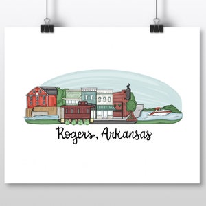 May include: A print featuring a colorful illustration of Rogers, Arkansas. The artwork depicts a cityscape with buildings, a train car, and a boat on a river, with the text "Rogers, Arkansas" below.