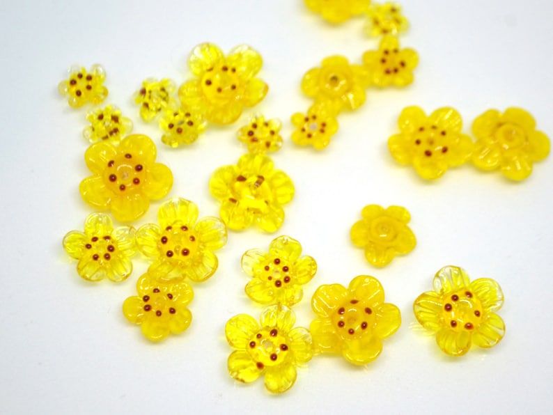 Sunny yellow flower glass beadsSet of 12pcsTransparentOpaqueArtisan LampworkBright yellowBead setSunshine yellowFloral lampwork bead image 1