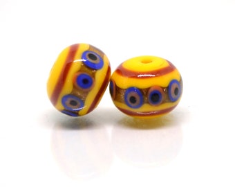 Yellow glass beads, red srtipes, Yellow lampwork beads, Rondelle glass beads, Blue dots, devil eye beads, Handmade beads