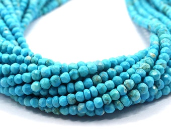 May include: A strand of turquoise gemstone beads, faceted and a bright blue color. The beads are strung together to form a necklace or bracelet.