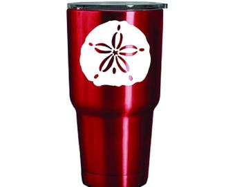 May include: A red stainless steel tumbler with a white sand dollar design.