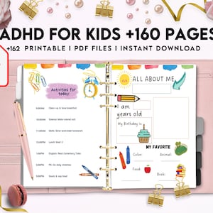 May include: A pink binder with a white page open to a section titled "All About Me". The page has a sun with a smiley face, a pencil, and a space for a child to write their age and birthday. The page also has a section titled "My Favorite" with spaces for a child to write their favorite color, animal, food, and book.