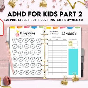 May include: A pink binder with a white page open to a 30-day saving chart with piggy banks and a monthly finances page for January. The text "ADHD for Kids Part 2" is at the top of the page.