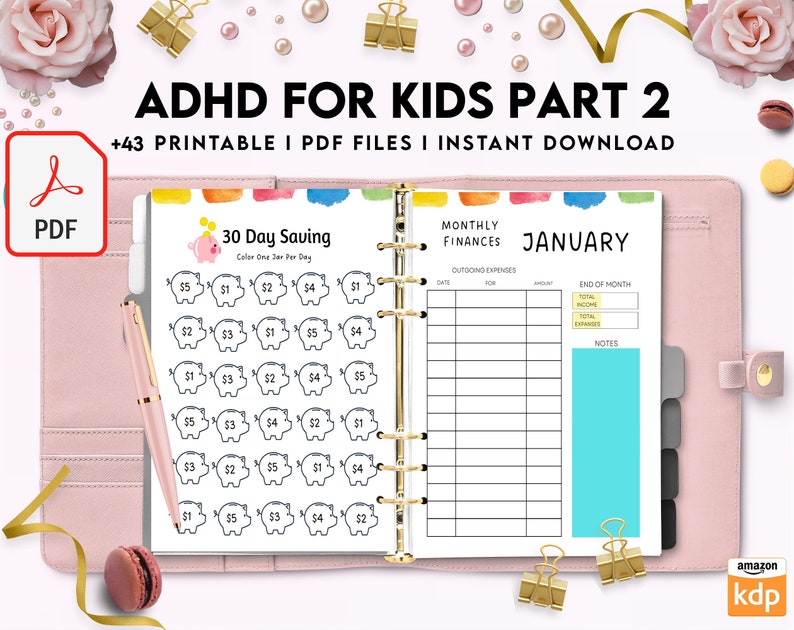 May include: A pink binder with a white page open to a 30-day saving chart with piggy banks and a monthly finances page for January. The text "ADHD for Kids Part 2" is at the top of the page.