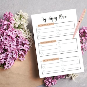Puede incluir: Hoja de trabajo imprimible con el t&iacute;tulo "My Happy Place" y secciones para enumerar libros, canciones y juegos favoritos. La hoja de trabajo est&aacute; rodeada de flores de lila.