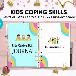 May include: A pink binder with a blue and green cover featuring a rainbow design and the text "Kids Coping Skills JOURNAL." The cover also includes illustrations of children. The binder is open to a page with the text "This journal belongs to:"