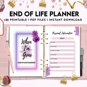 May include: An open ring-bound planner with a pink cover, featuring a title page with the text When I'm Gone and a Personal Information page. The design includes purple floral accents, a pink pen, and gold binder clips on a light background.