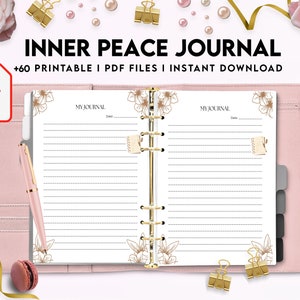 Pode incluir: Um di&aacute;rio rosa e dourado com o texto "INNER PEACE JOURNAL" e "MY JOURNAL" na capa. O di&aacute;rio tem uma encaderna&ccedil;&atilde;o de argolas douradas e &eacute; decorado com desenhos florais. O texto "+60 PRINTABLE I PDF FILES I INSTANT DOWNLOAD" tamb&eacute;m est&aacute; na capa.