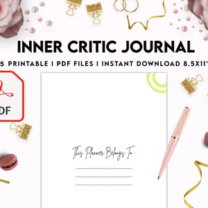 May include: A printable journal with the title "Inner Critic Journal" and the text "This Planner Belongs To:" on a white background. The journal is surrounded by decorative elements such as pink roses, gold clips, and macarons.