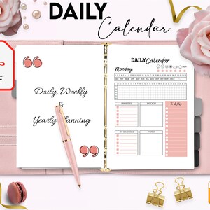 May include: A pink and gold daily planner with the text "DAILY Calendar" and "Daily, Weekly & Yearly Planning". The planner has a section for Monday with a calendar grid, a to-do list, and sections for priorities, errands, and notes.