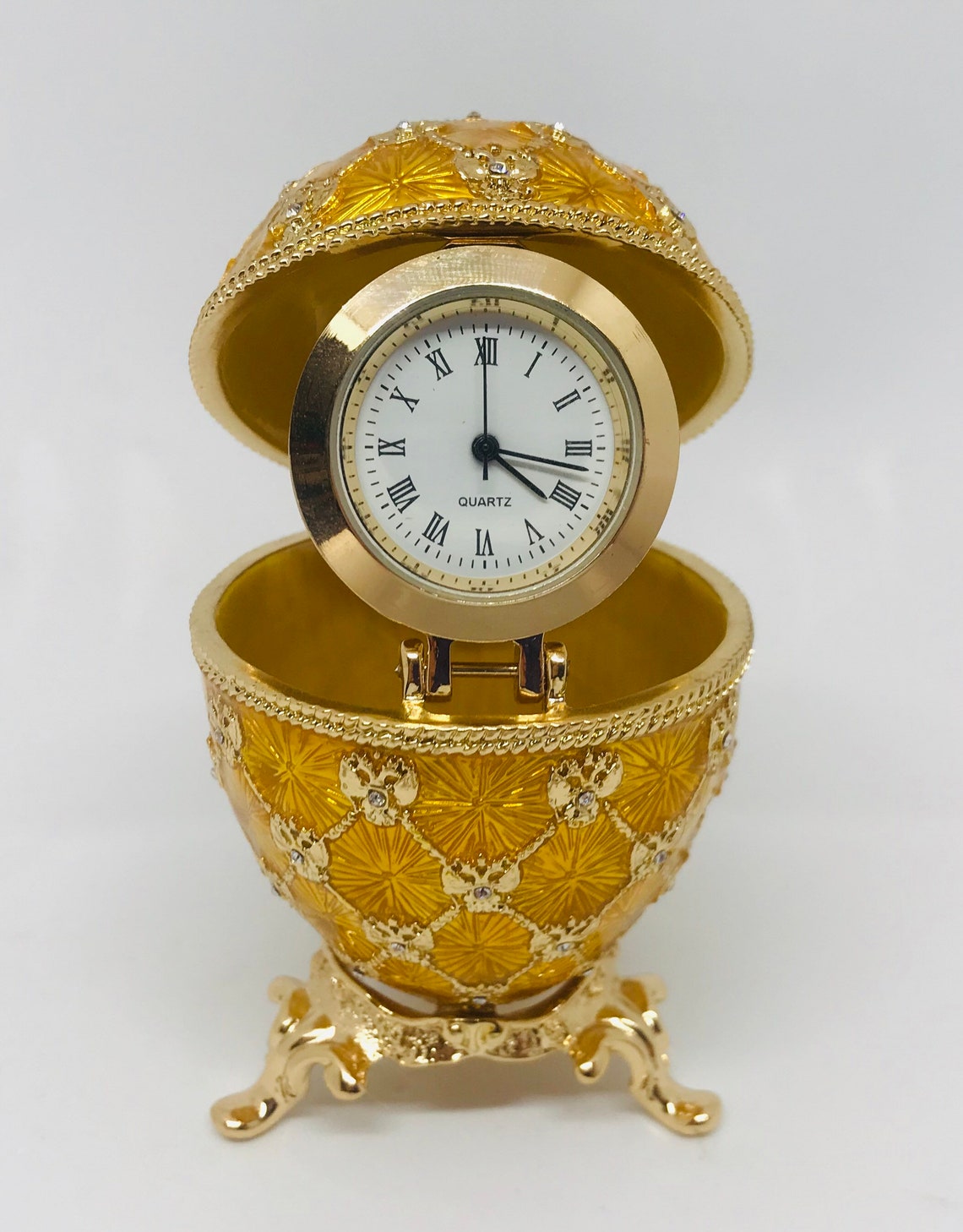 A Fabergestyle egg with a clock Faberge clock Etsy