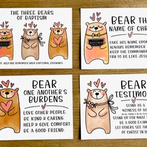 May include: Four illustrated cards with a bear theme. Each card features a different message about Christian values. The first card shows three bears with the text "The Three Bears of Baptism". The second card shows a bear holding a book with the text "Bear the Name of Christ". The third card shows a bear holding a heart with the text "Bear One Another's Burdens". The fourth card shows a bear holding a flower with the text "Bear Testimony".
