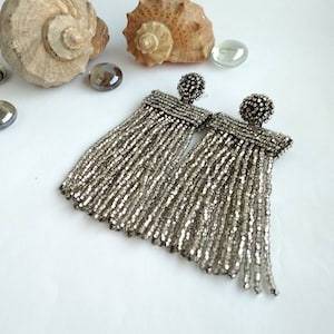 Large tassel silver beaded earrings Big chunky waterfall grey earrings Oscar de la Renta chandelier earrings Long dangle bridal earrings