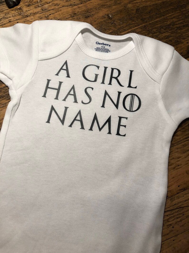 a girl has no name onesie
