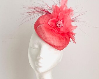 Coral Pink Royal Ascot hat, coral pink pillbox hat, coral pink fascinator hat, coral pink cocktail hat, coral pink Kentucky Derby hat