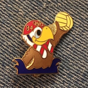 Pin's Sam L'aigle Olympique 1984 – Ton Or, édition Los Angeles