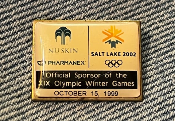 2002 Olympic Lapel Pin ~ SLC ~ Salt Lake City ~ Sponsor ~ Nuskin